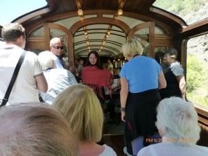 A fashion show in the bar car.